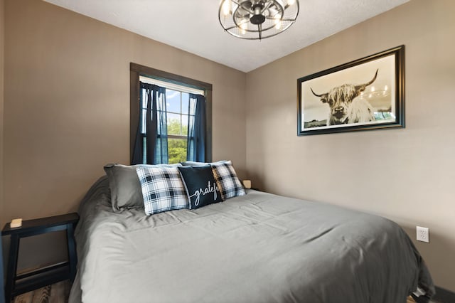 bedroom featuring wood-type flooring