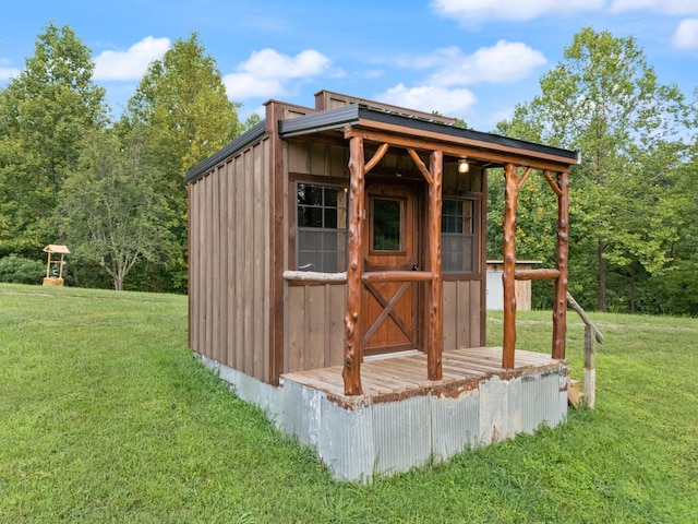 view of outdoor structure with a lawn