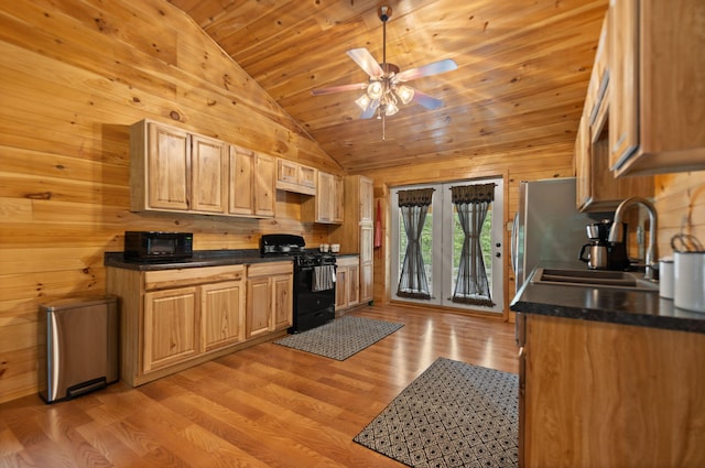 kitchen with sink, light wood-type flooring, wooden ceiling, ceiling fan, and black appliances