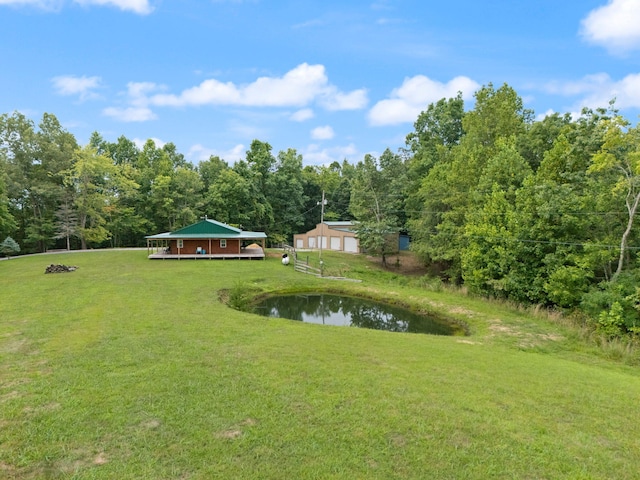 view of yard with a water view