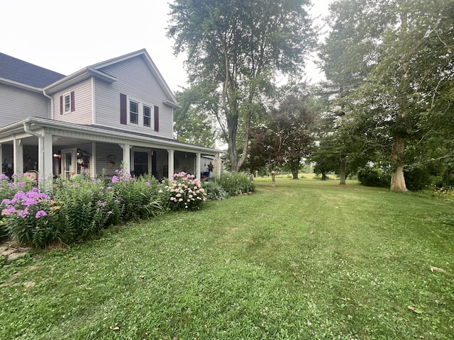 view of yard with a porch