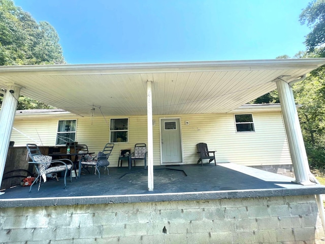 exterior space featuring a carport