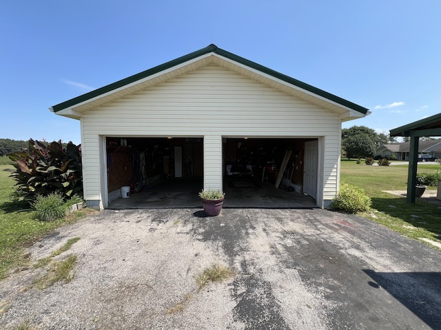 garage with a lawn