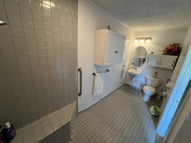 bathroom featuring tile patterned flooring and toilet