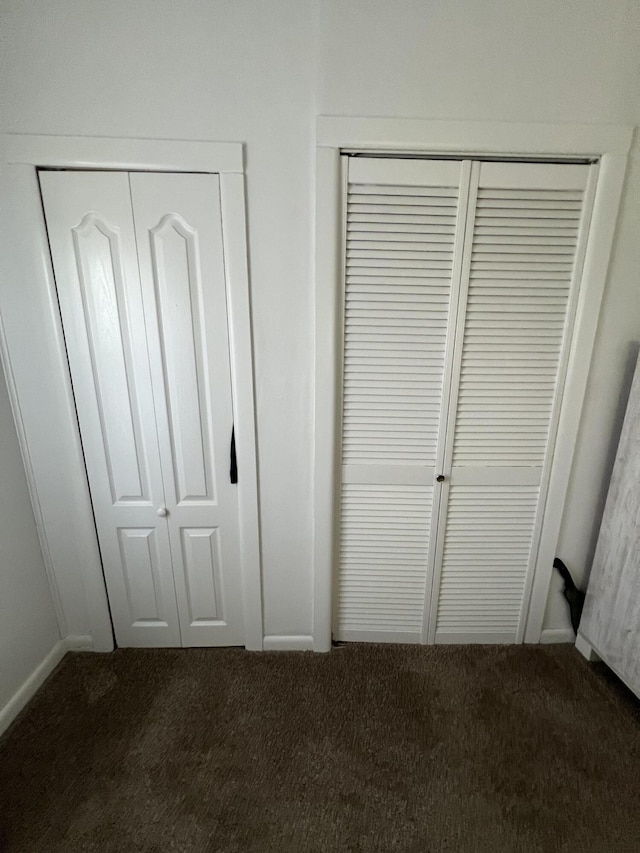 unfurnished bedroom with carpet