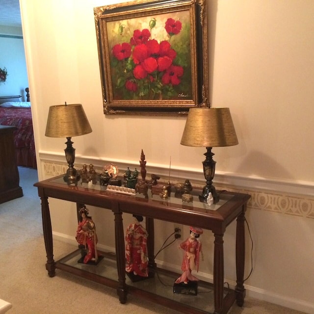 interior details featuring carpet flooring