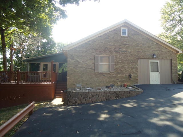 view of front of house with a wooden deck