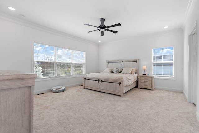 bedroom featuring light carpet, baseboards, and ornamental molding