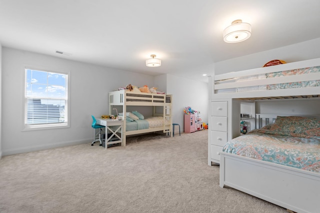 carpeted bedroom with visible vents