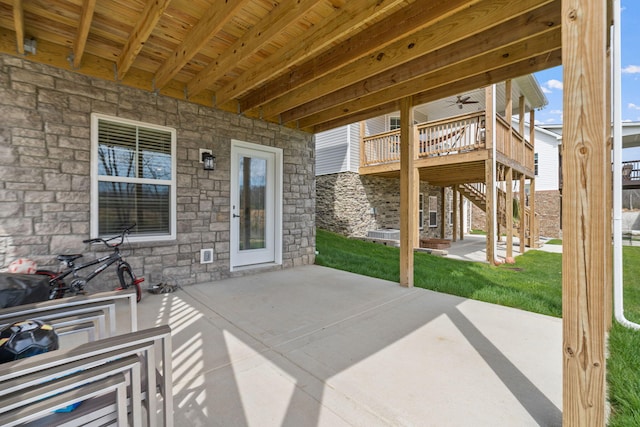 view of patio featuring stairway