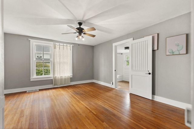 spare room featuring ceiling fan and wood-type flooring