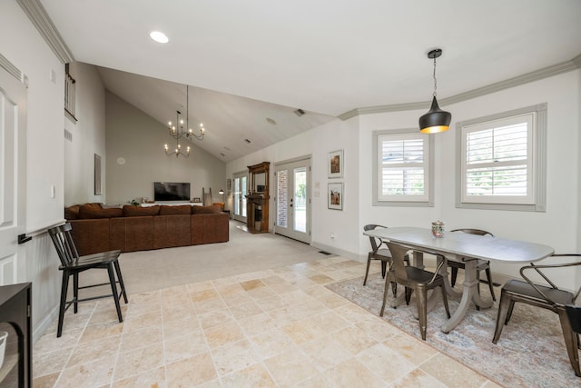 dining space with light tile patterned floors, an inviting chandelier, and ornamental molding