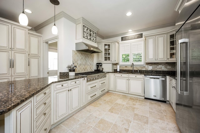 kitchen featuring stainless steel appliances, a sink, range hood, tasteful backsplash, and crown molding