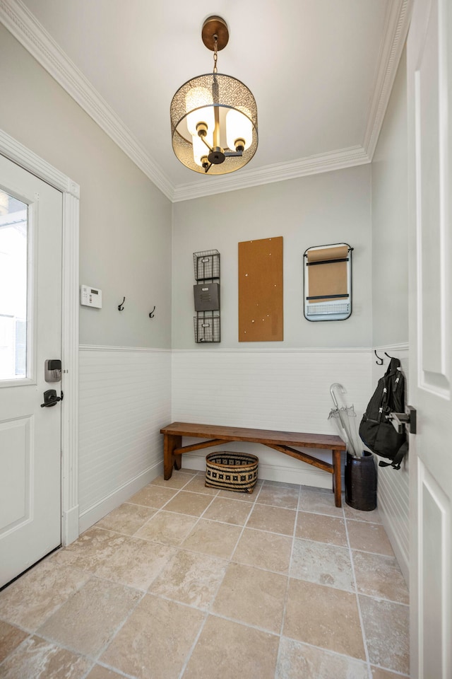 mudroom featuring tile patterned floors and crown molding