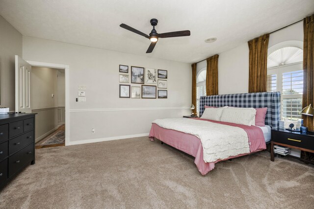 bedroom featuring ceiling fan and carpet flooring