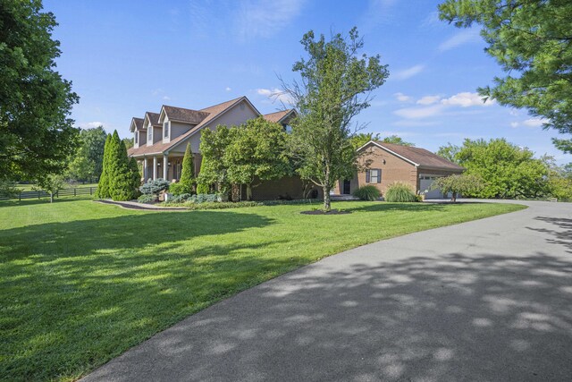 view of front of home with a front yard