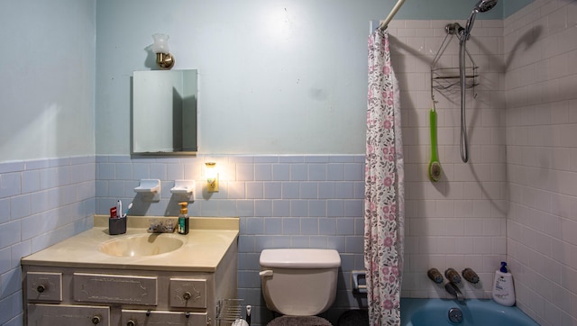 full bathroom with tile walls, toilet, vanity, shower / bathtub combination with curtain, and backsplash