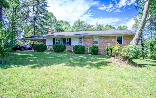 ranch-style home featuring a front lawn