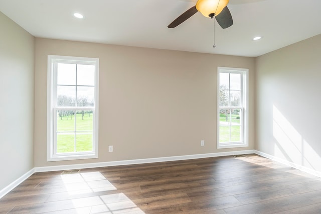 unfurnished room featuring hardwood / wood-style floors and ceiling fan