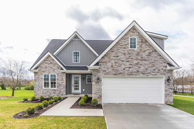 craftsman-style house featuring a garage and a front lawn