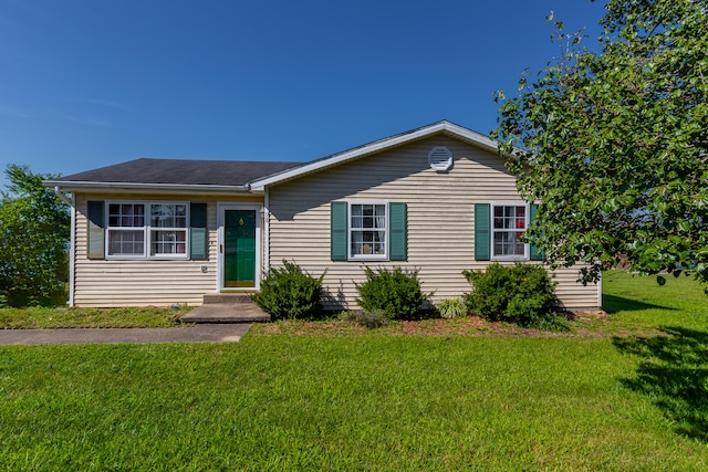 ranch-style house with a front yard