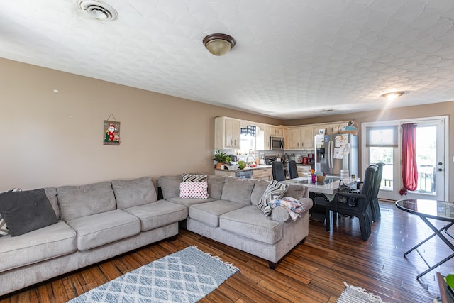 living room with hardwood / wood-style floors