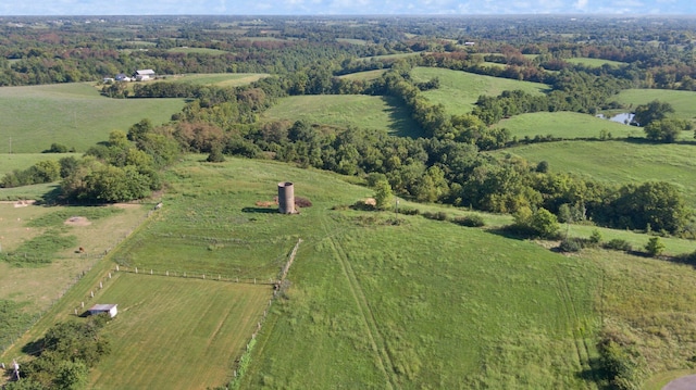 birds eye view of property featuring a rural view