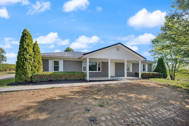 ranch-style home featuring a porch