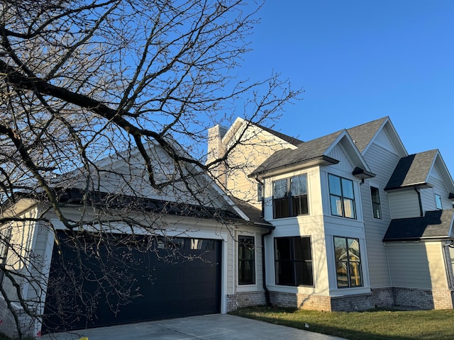 view of property exterior featuring a garage