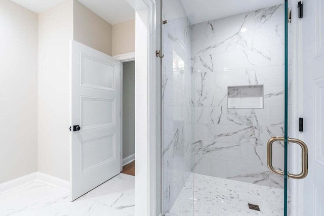 bathroom featuring an enclosed shower and tile patterned floors