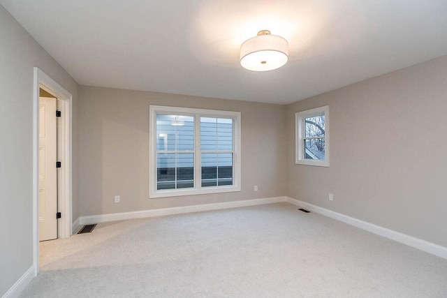 view of carpeted spare room