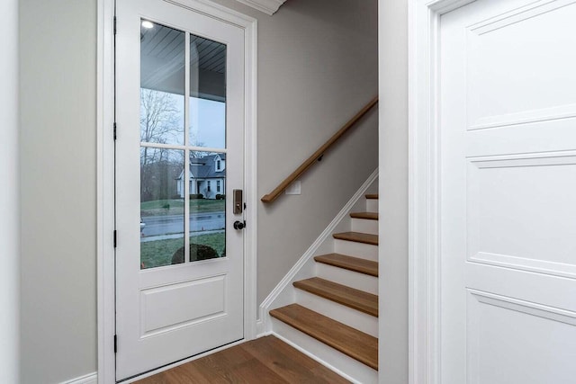 stairway with wood-type flooring