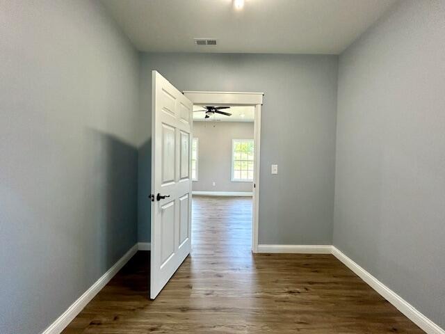 hallway featuring hardwood / wood-style floors