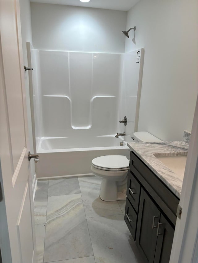 full bathroom with toilet, shower / washtub combination, and vanity