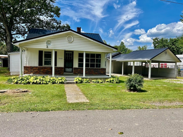 view of front of home featuring a front lawn and a porch