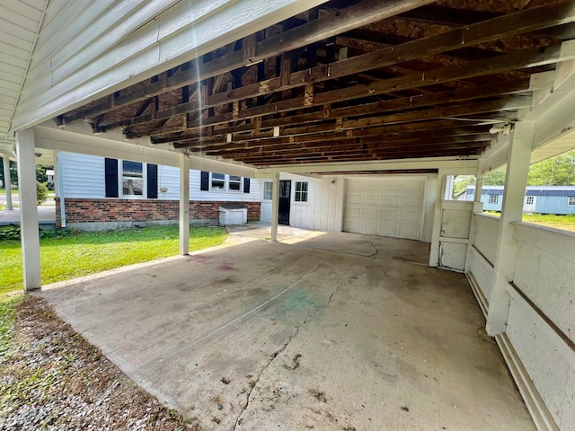 view of patio with a garage