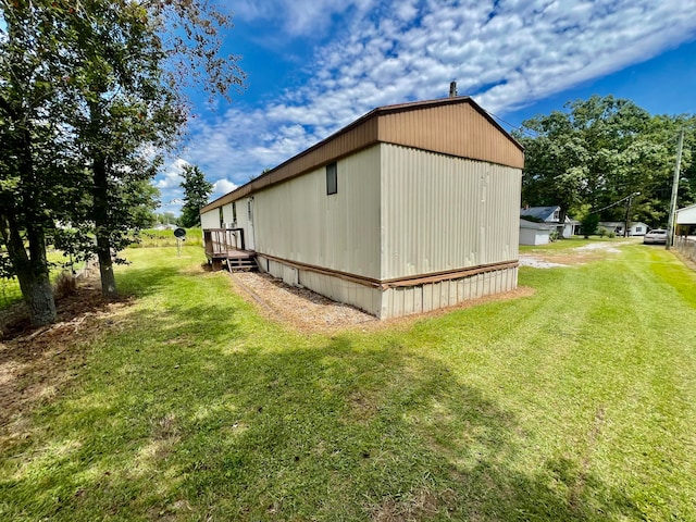 view of property exterior featuring a lawn