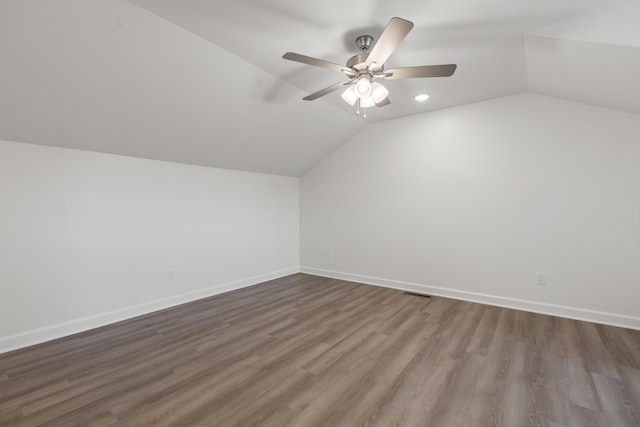 bonus room featuring ceiling fan, wood-type flooring, and lofted ceiling