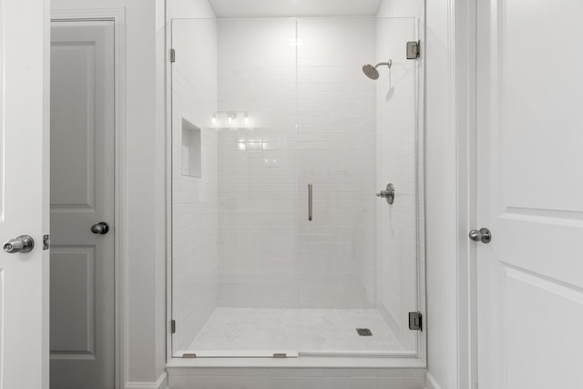 bathroom with an enclosed shower