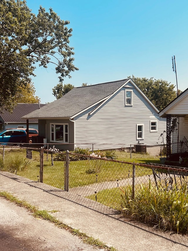 view of home's exterior with a yard