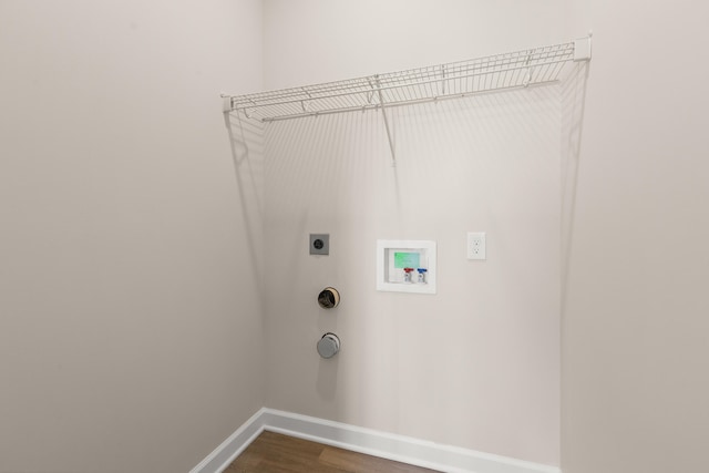 laundry area with hardwood / wood-style floors, washer hookup, and electric dryer hookup