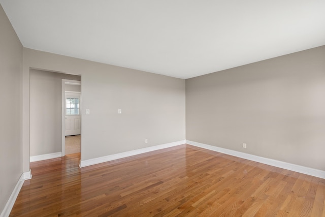 spare room featuring hardwood / wood-style flooring