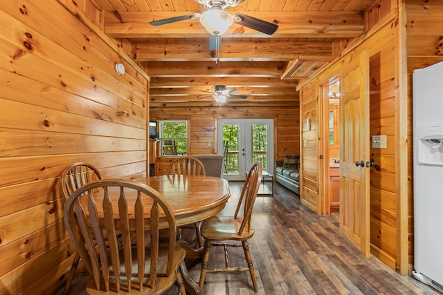 dining space featuring ceiling fan, french doors, wooden ceiling, hardwood / wood-style flooring, and beamed ceiling