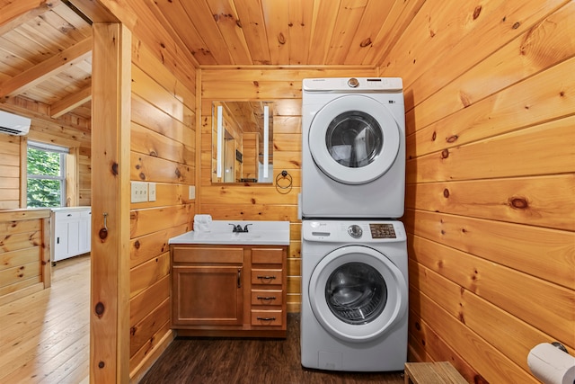 washroom featuring dark hardwood / wood-style flooring, stacked washer and clothes dryer, wood walls, and wooden ceiling