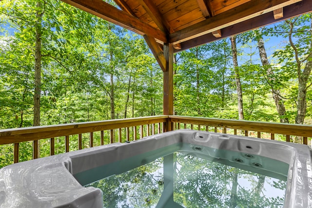 deck with a hot tub