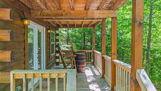 wooden terrace featuring french doors