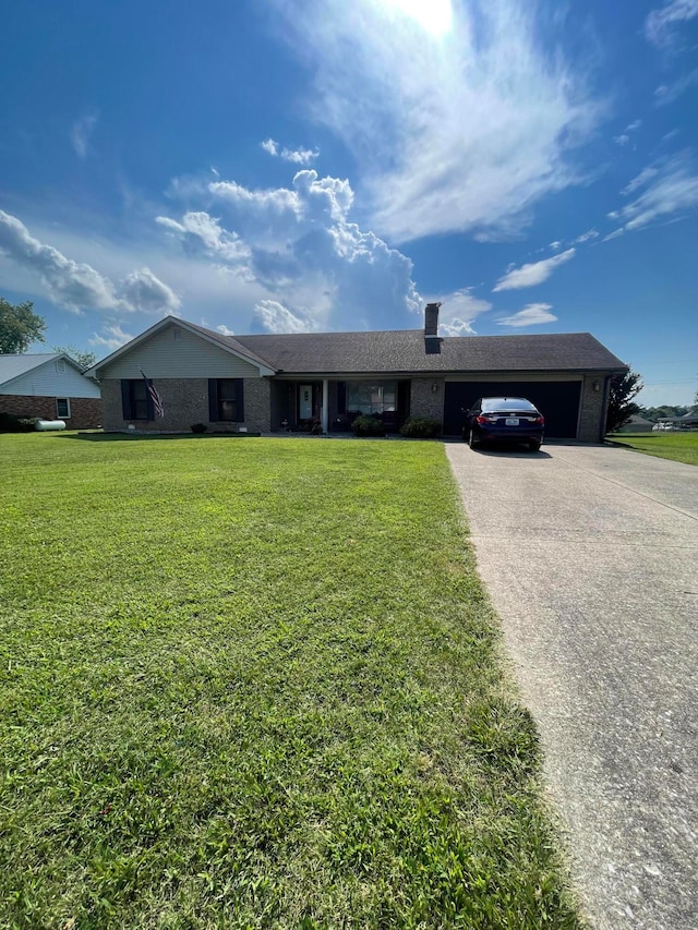 ranch-style home with a front lawn and a garage