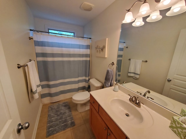 bathroom featuring vanity, tile patterned flooring, toilet, and a shower with curtain