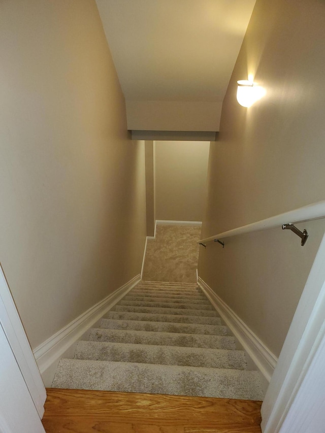 staircase with baseboards