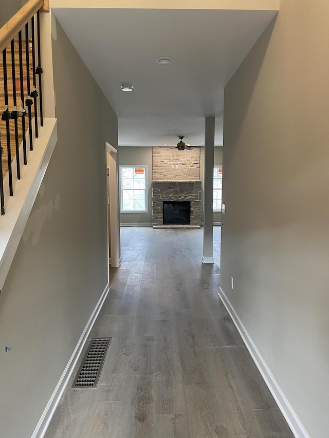 hallway featuring hardwood / wood-style flooring